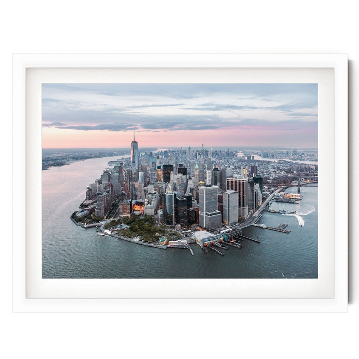 An aerial view of the New York City skyline, showcasing the iconic skyscrapers and the surrounding waterways.