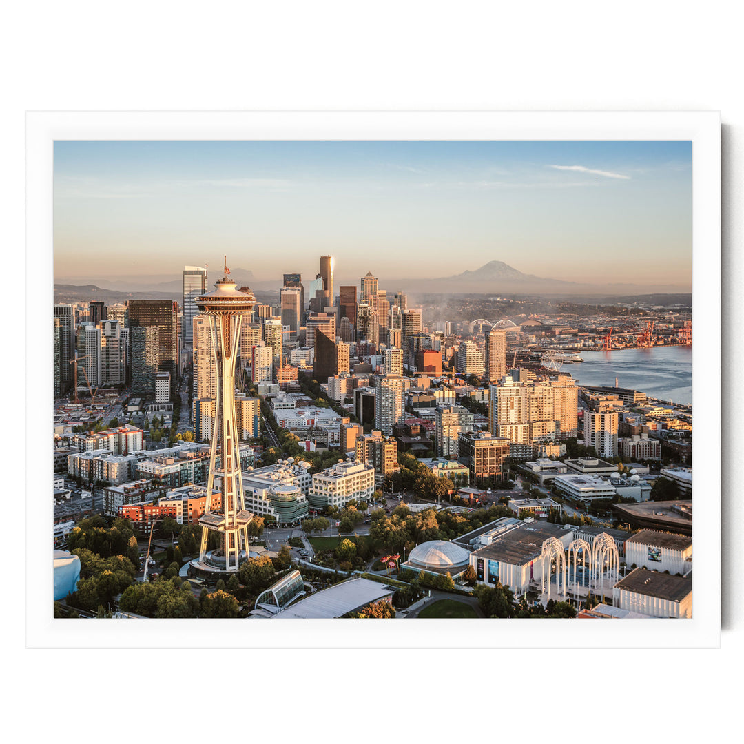a panoramic view of the Seattle skyline, featuring the iconic Space Needle and the surrounding cityscape.