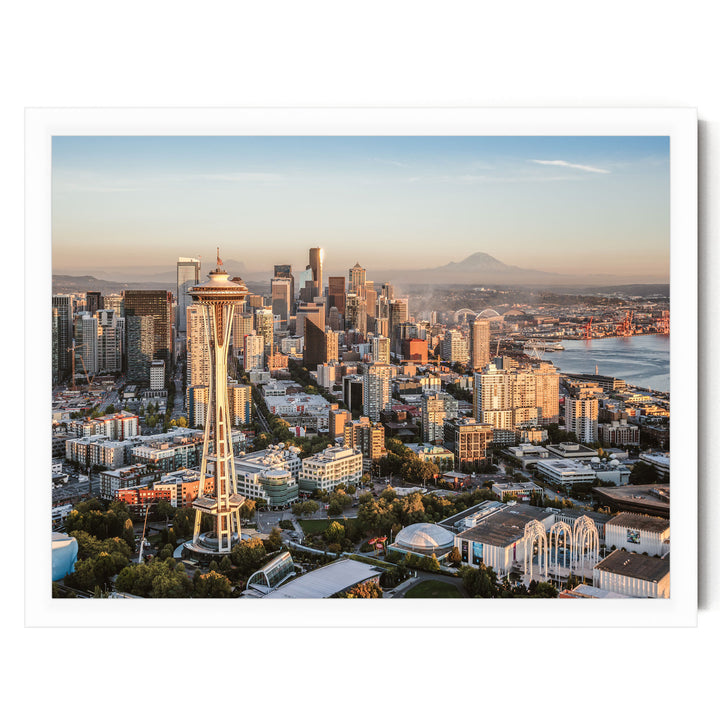 a panoramic view of the Seattle skyline, featuring the iconic Space Needle and the surrounding cityscape.