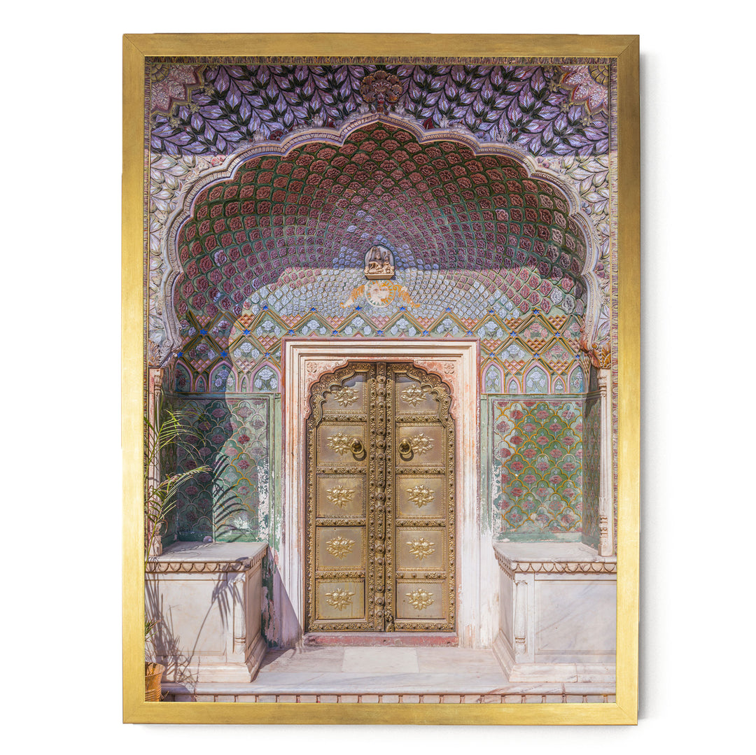 a beautifully decorated doorway with intricate patterns and designs, including a large archway and ornate golden doors.