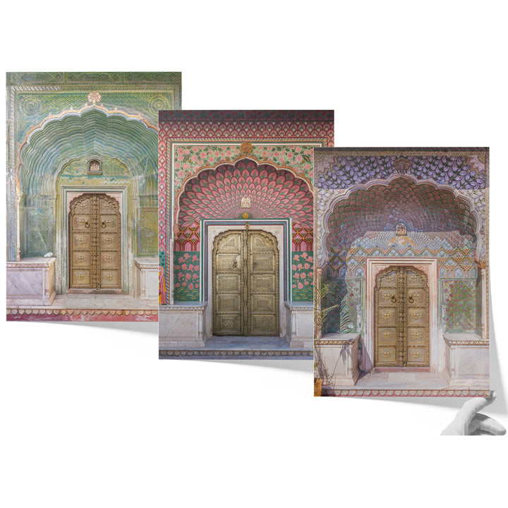 three paintings of doors in a building