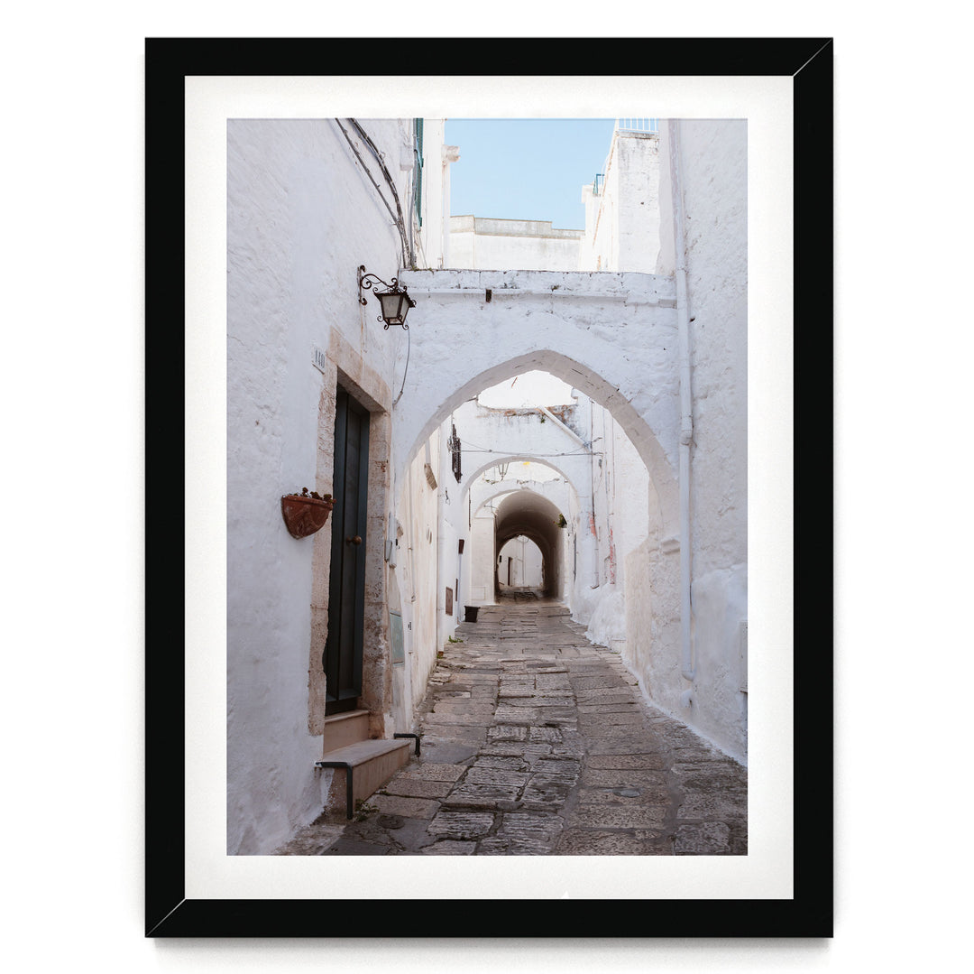 Ostuni, Puglia I, Italy – fine art print in a black frame with white mat