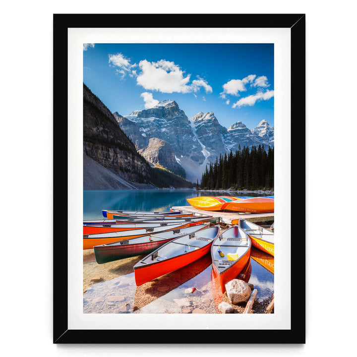 Canoes at Moraine Lake, Banff, Canada – fine art print in a black frame with white mat