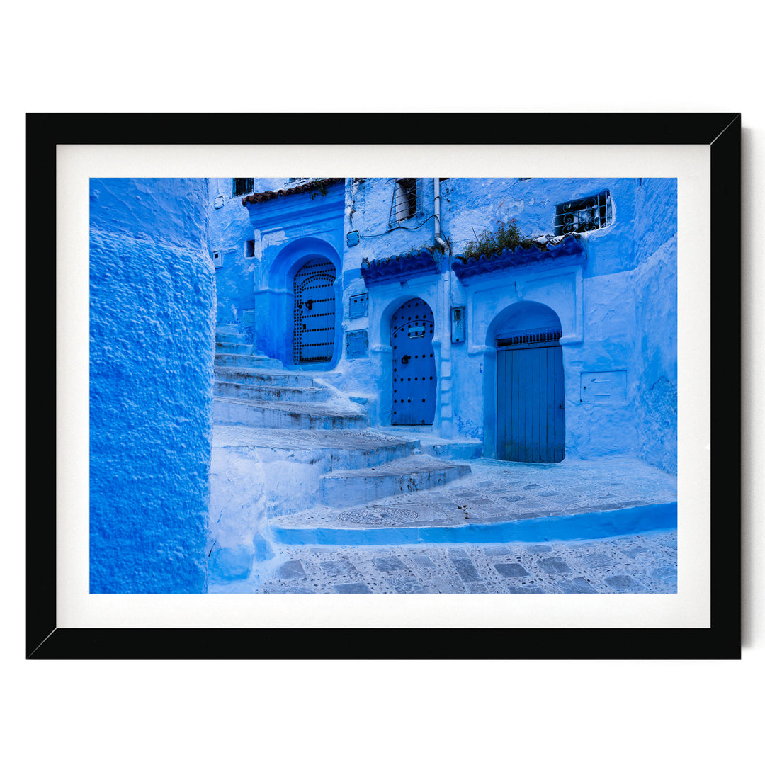 In the Streets of Chefchaouen, Morocco – fine art print in a black frame with white mat