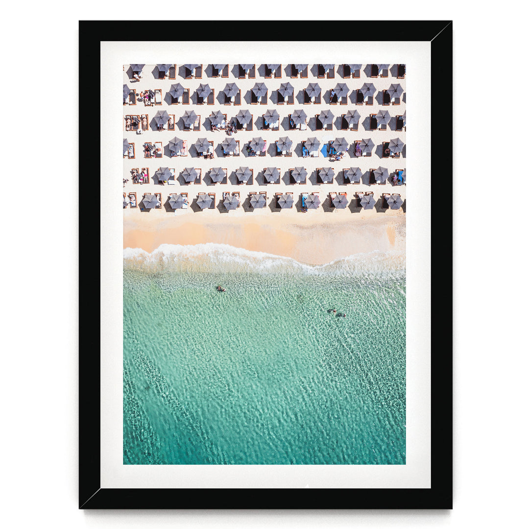 Mykonos Beach II, Elia, Greece – fine art print in a black frame with white mat