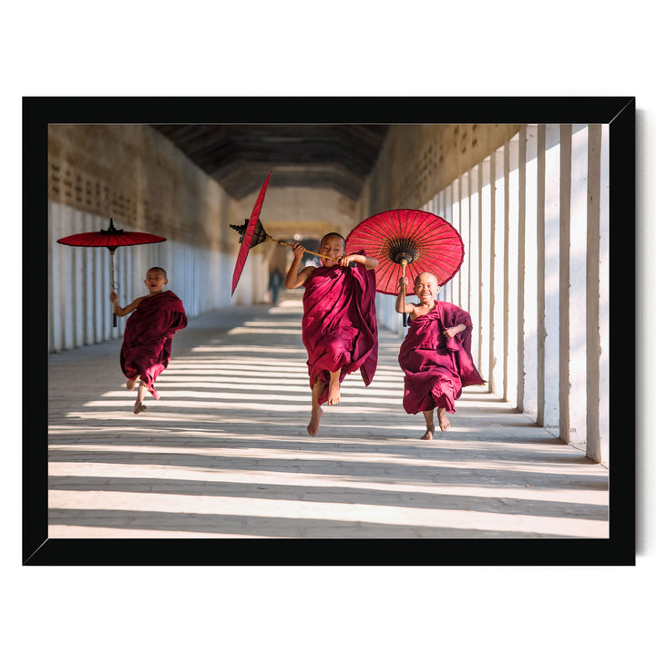 Joyful Monks II, Southeast Asia – fine art print in a black frame, no mat