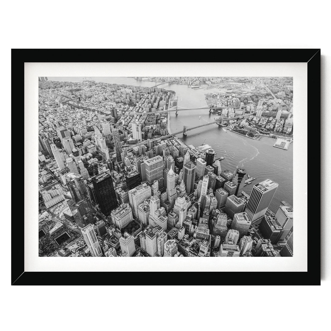 Flying over Manhattan, New York City – fine art print in a black frame with white mat