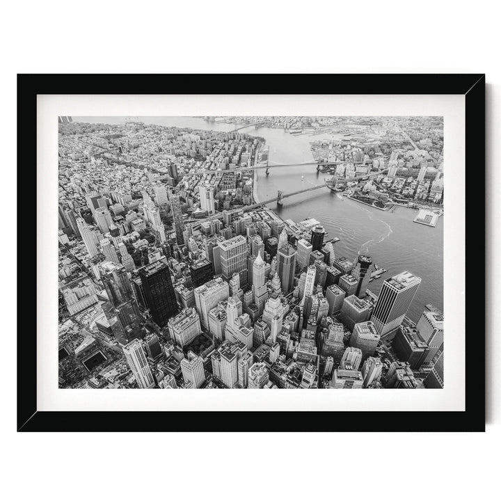 Flying over Manhattan, New York City – fine art print in a black frame with white mat