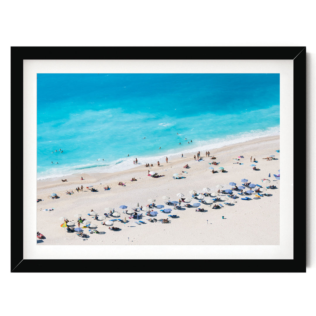 Beach Aerial, Greece I – fine art print in a black frame with white mat