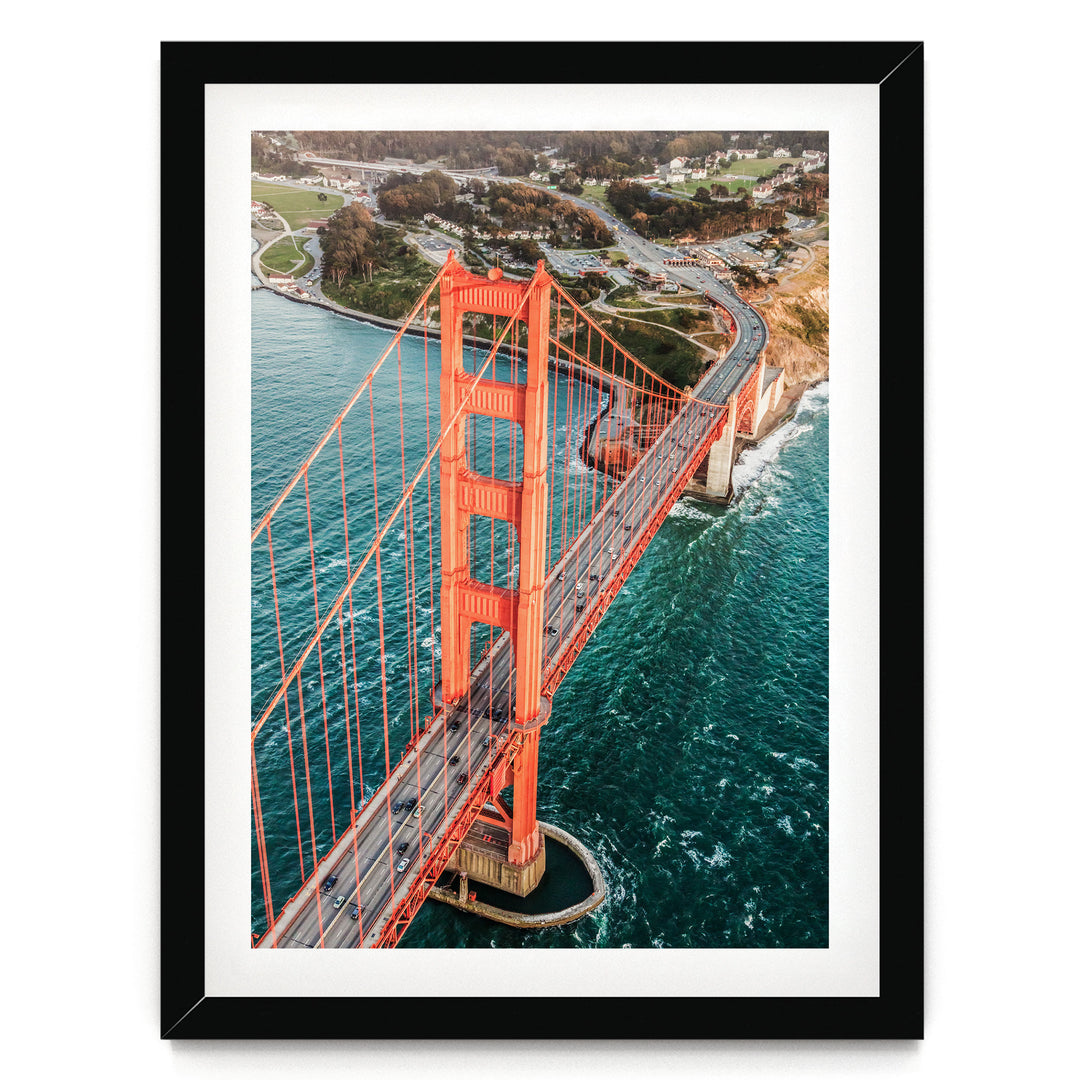 Flying over the Golden Gate Bridge I, San Francisco – fine art print in a black frame with white mat