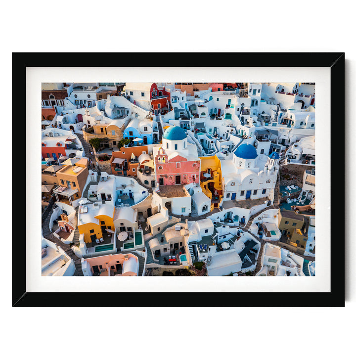 Santorini Colors, Oia, Greece – fine art print in a black frame with white mat