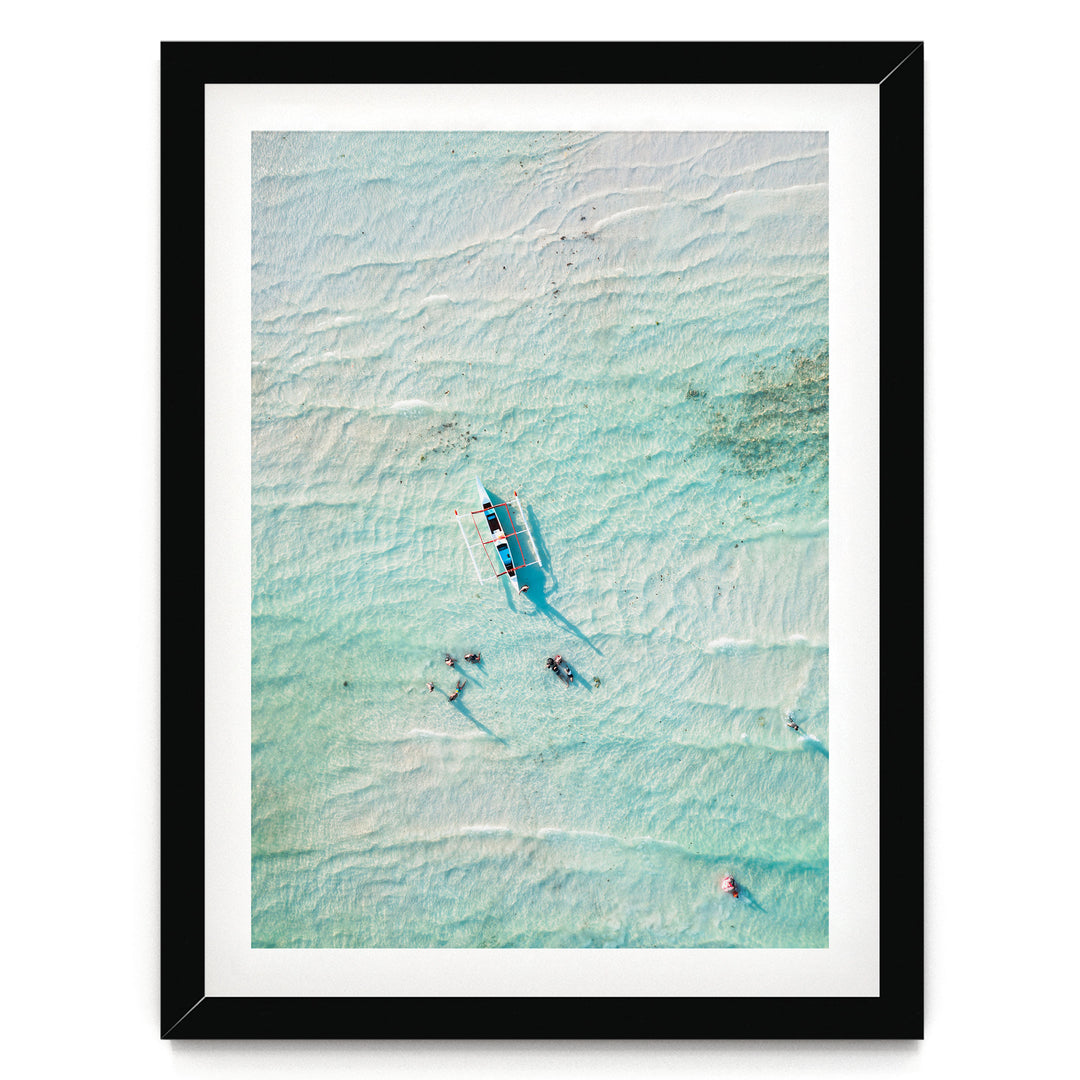 In the Turquoise Sea, Indian Ocean – fine art print in a black frame with white mat