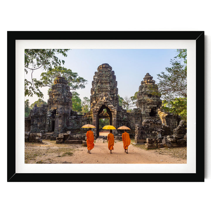 Monks at Angkor Wat, Cambodia – fine art print in a black frame with white mat