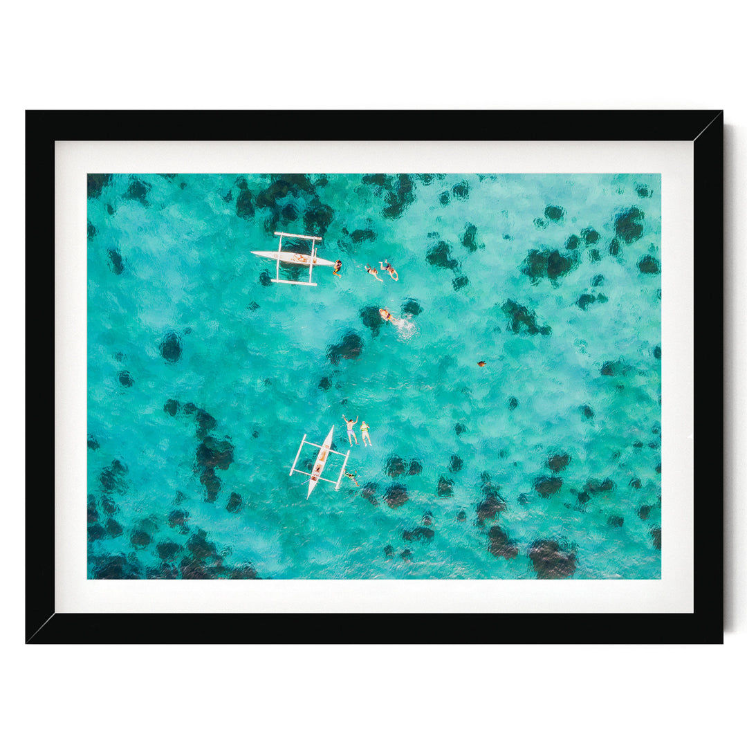 Snorkeling in the Sea, Maldives – fine art print in a black frame with white mat