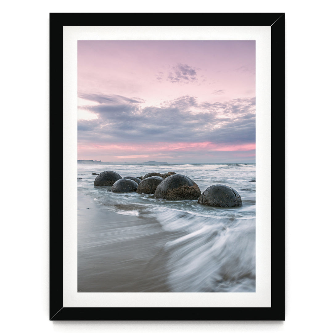 Moeraki Boulders II, New Zealand – fine art print in a black frame with white mat