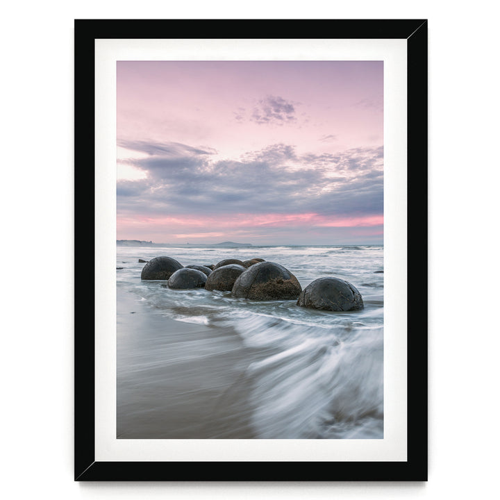 Moeraki Boulders II, New Zealand – fine art print in a black frame with white mat