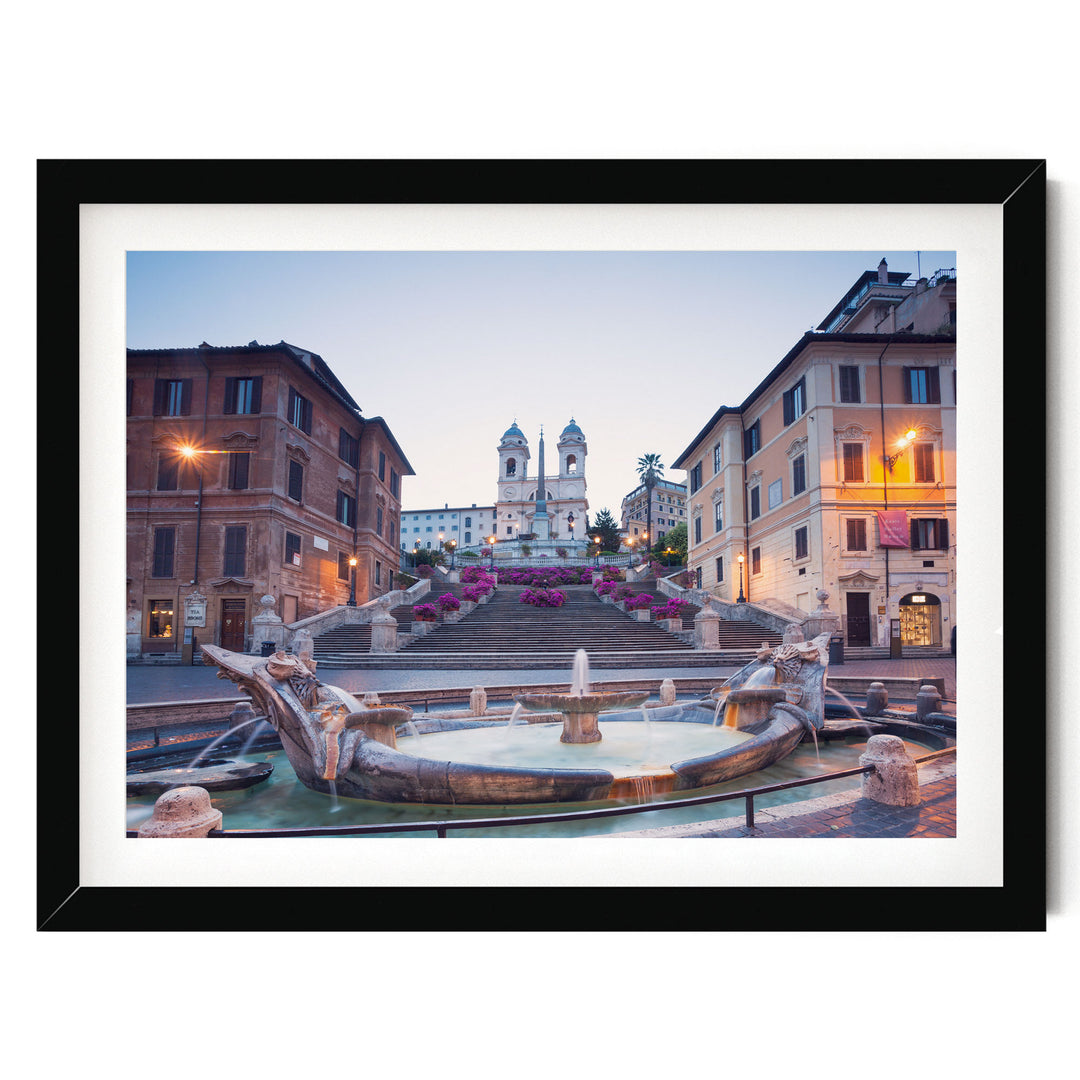 a picturesque scene of a fountain surrounded by ornate buildings, with a church steeple visible in the background.