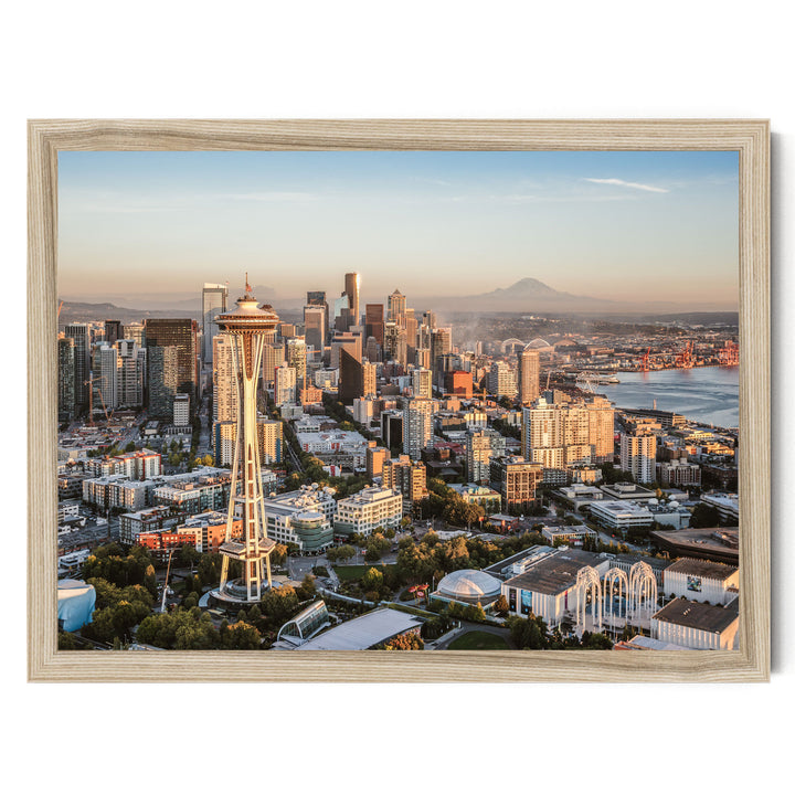 a cityscape with a tall tower, likely a landmark, surrounded by a variety of buildings and skyscrapers. The city appears to be at sunset, with the warm, golden light illuminating the scene.