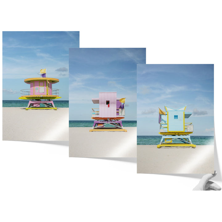 A collage of three colorful lifeguard towers on a beach, with each tower featuring a unique design and color scheme.