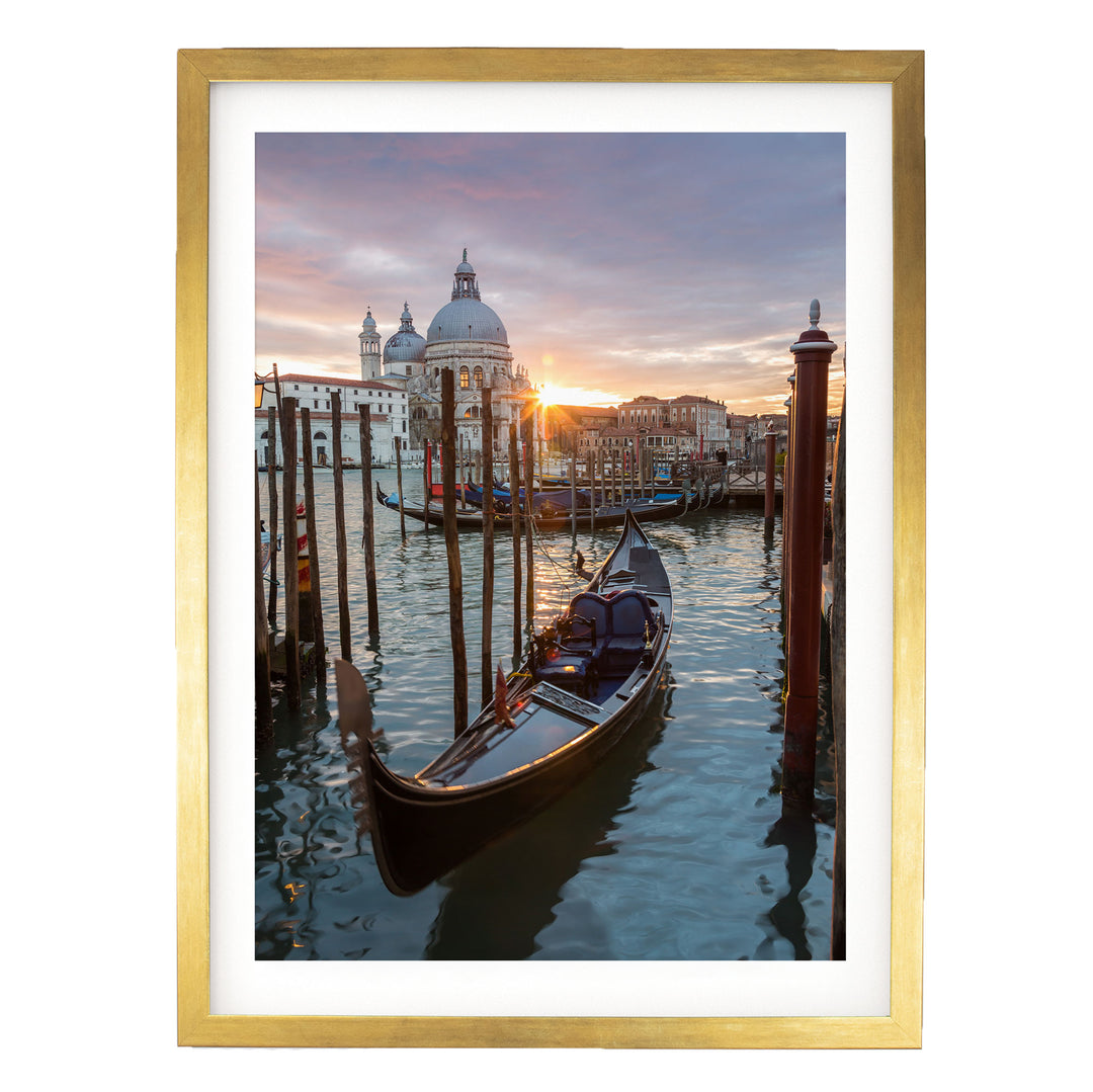 a gondola floating on the water, with a picturesque view of the Grand Canal in Venice, Italy, featuring the iconic St. Mark's Basilica and the surrounding architecture.