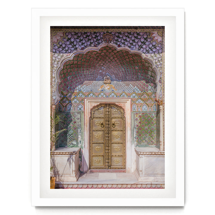 a beautifully decorated doorway with intricate patterns and designs, including a large archway and ornate golden doors.