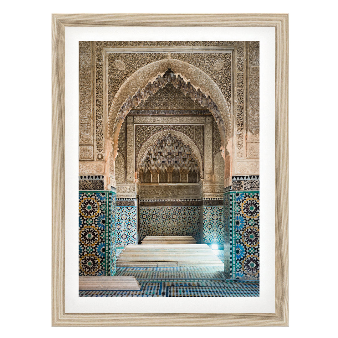 an ornate, intricately decorated interior space with a large archway, tiled walls, and a tiled floor.