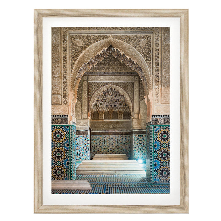 an ornate, intricately decorated interior space with a large archway, tiled walls, and a tiled floor.