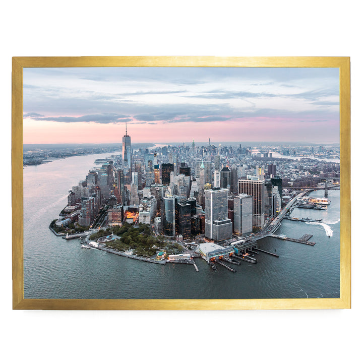 The image is an aerial view of the New York City skyline, showcasing the city's iconic skyscrapers and waterfront.