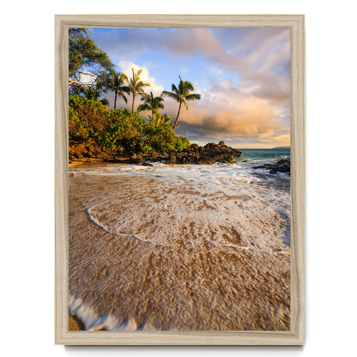 a serene tropical beach scene with swaying palm trees, crashing waves, and a picturesque sunset sky.