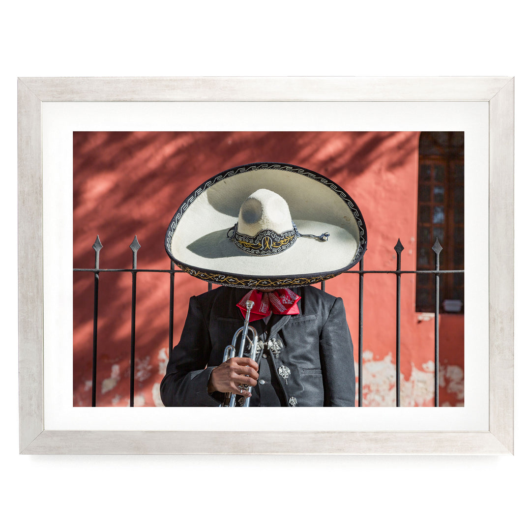 Mexican charro print in a silver frame with white mat