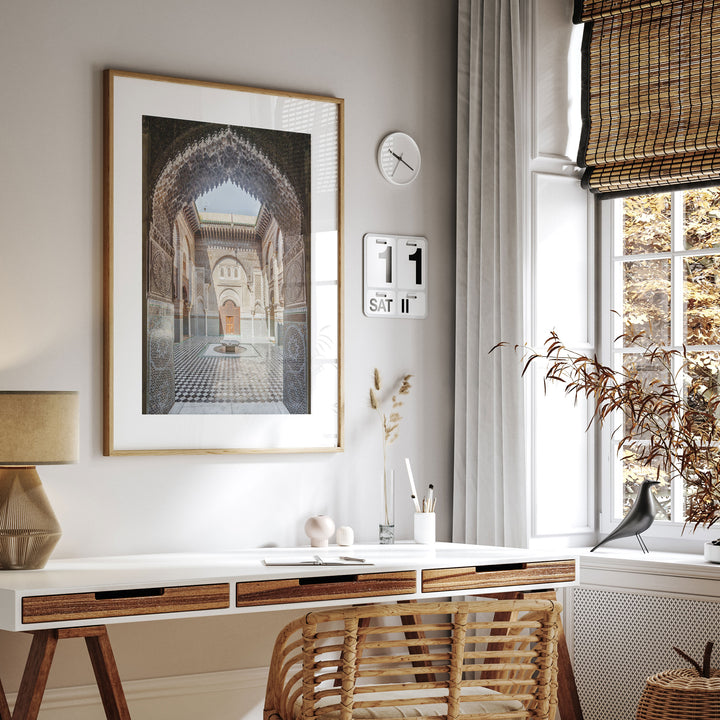 Ornate Madrasa Archway, Fes, Morocco framed print hanging in a styled interior
