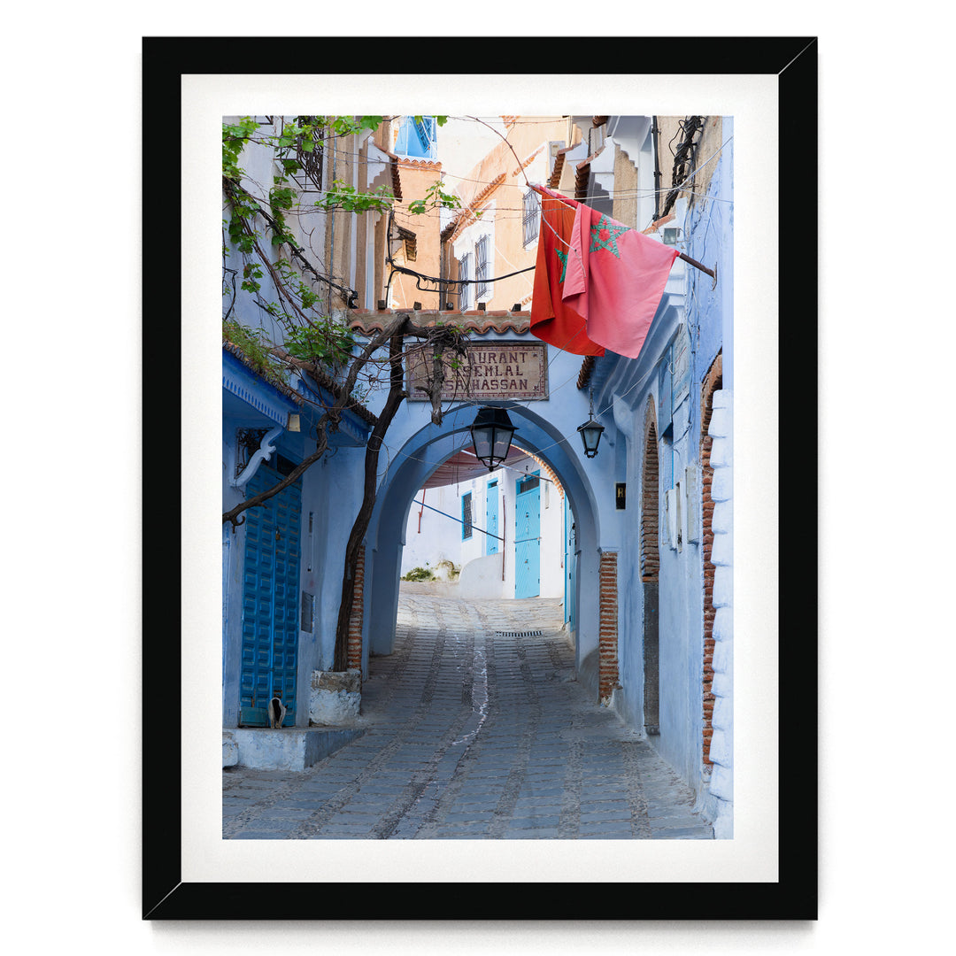 Moroccan Flag in the Blue City, Chefchaouen print in a black frame with white mat