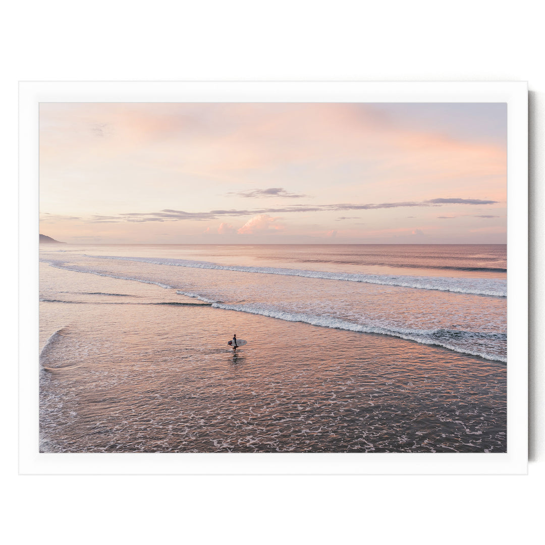 Lone Surfer on a Pink Beach II, Costa Rica print in a white frame without mat