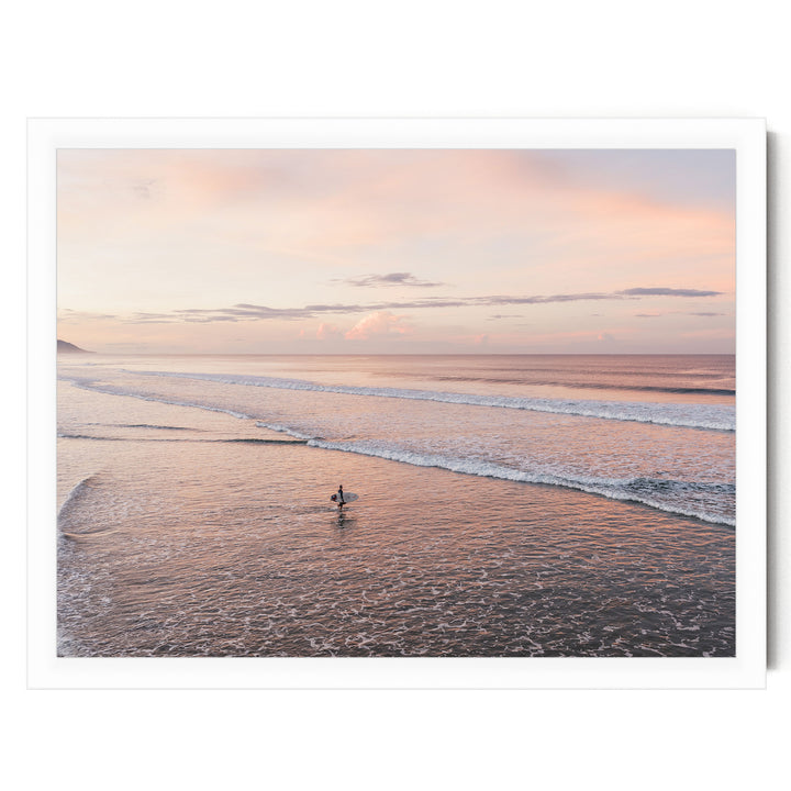 Lone Surfer on a Pink Beach II, Costa Rica print in a white frame without mat