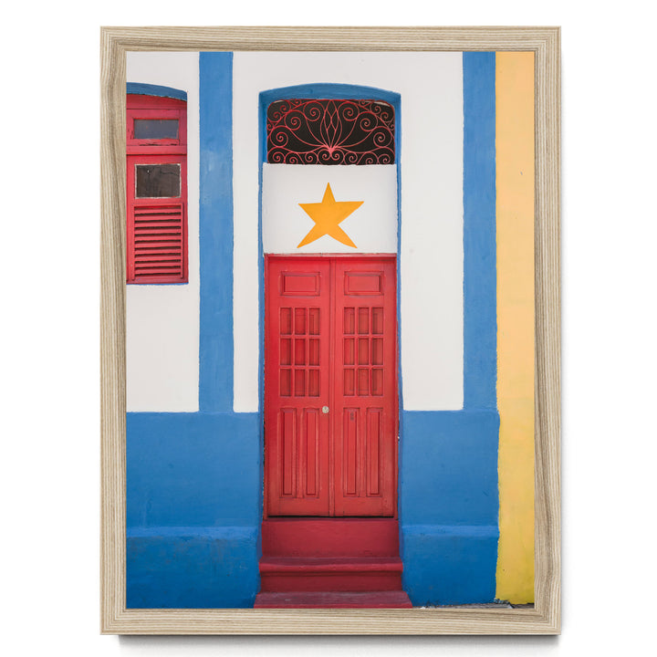 Red Door with Yellow Star, Olinda, Brazil print in a natural wood frame without mat