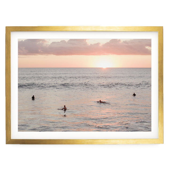 Surfers Waiting at Sunset, Costa Rica print in a gold frame with white mat