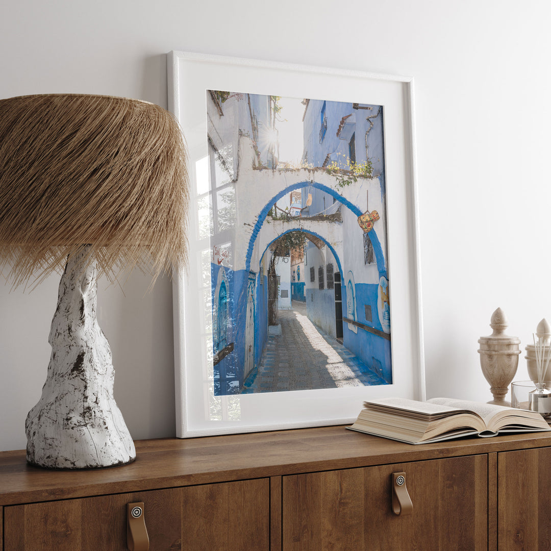 Blue Archways, Chefchaouen, Morocco print displayed in a bedroom setting