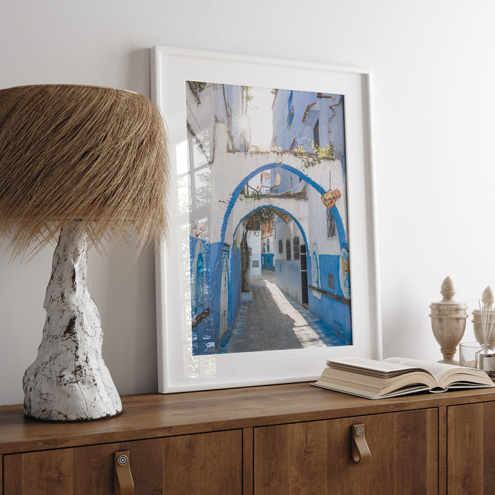 Blue Archways, Chefchaouen, Morocco print displayed in a bedroom setting