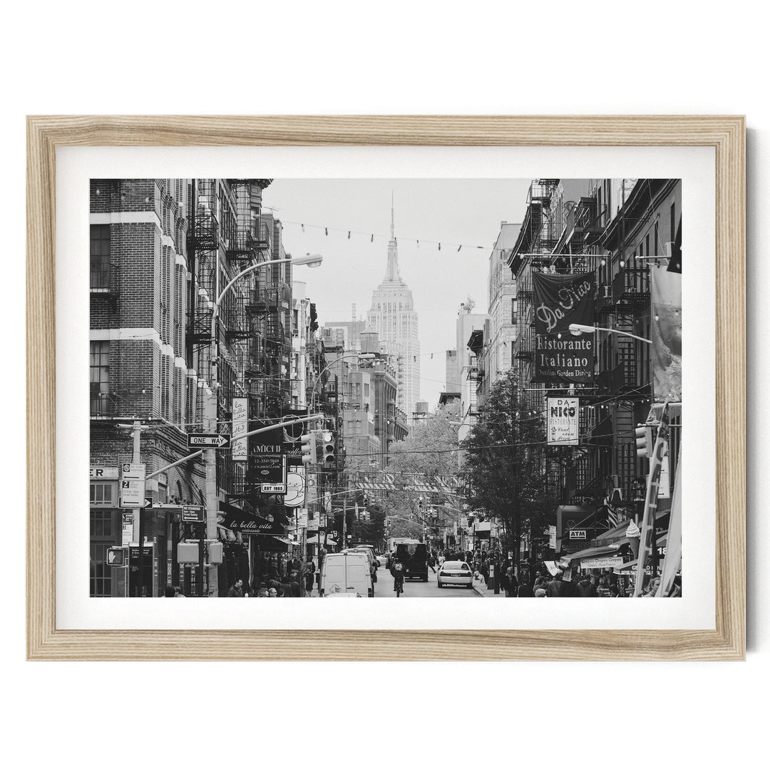 Little Italy and Empire State Building, New York City – B&W fine art print in a natural wood frame with white mat