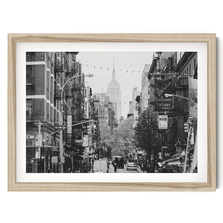 Little Italy and Empire State Building, New York City – B&amp;W fine art print in a natural wood frame with white mat