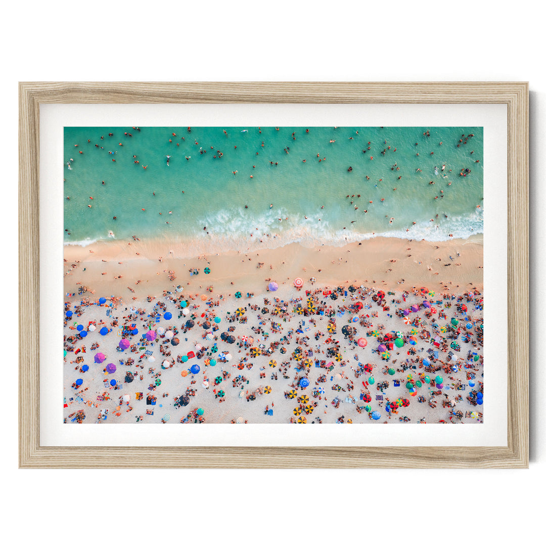 Beach Umbrellas from Above, Ipanema, Rio de Janeiro, Brazil fine art print in a natural wood frame with white mat