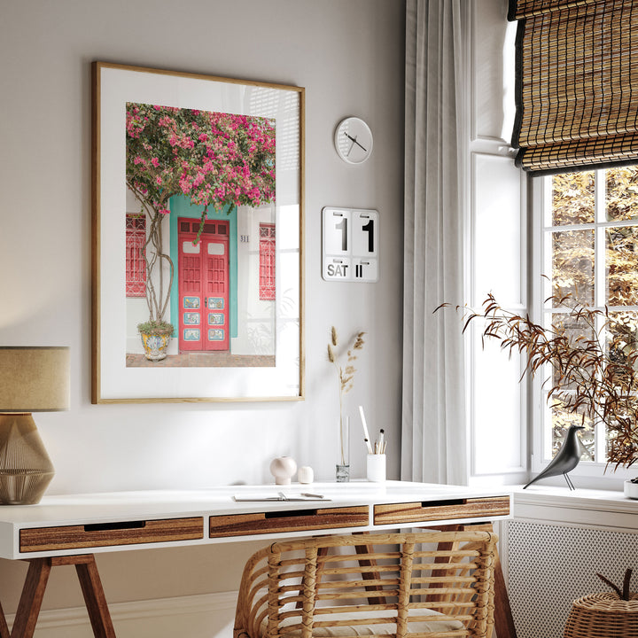 Bougainvillea and Red Door, Olinda, Brazil framed print hanging in a styled interior