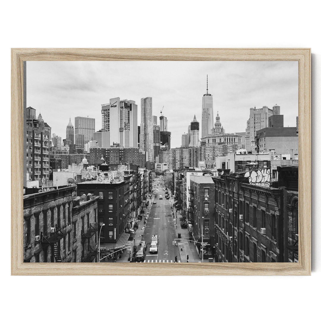 Lower Manhattan Street View, New York City – B&amp;W print in a natural wood frame without mat