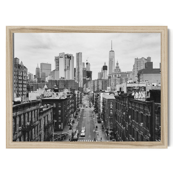 Lower Manhattan Street View, New York City – B&amp;W print in a natural wood frame without mat