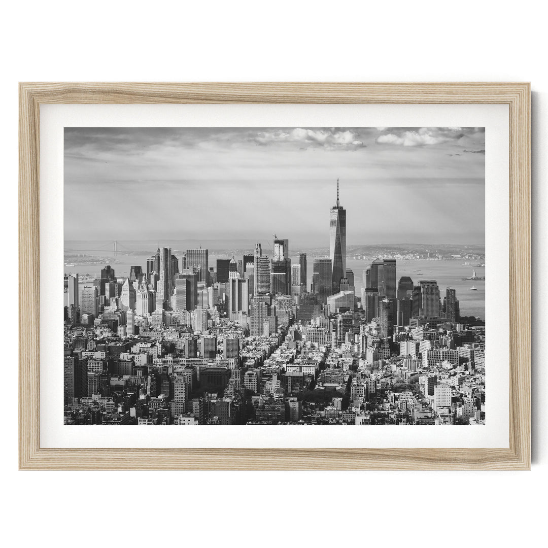 Manhattan Skyline from Above, New York City – B&W fine art print in a natural wood frame with white mat