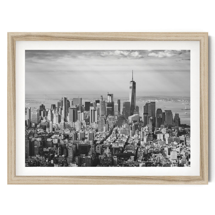 Manhattan Skyline from Above, New York City – B&amp;W fine art print in a natural wood frame with white mat