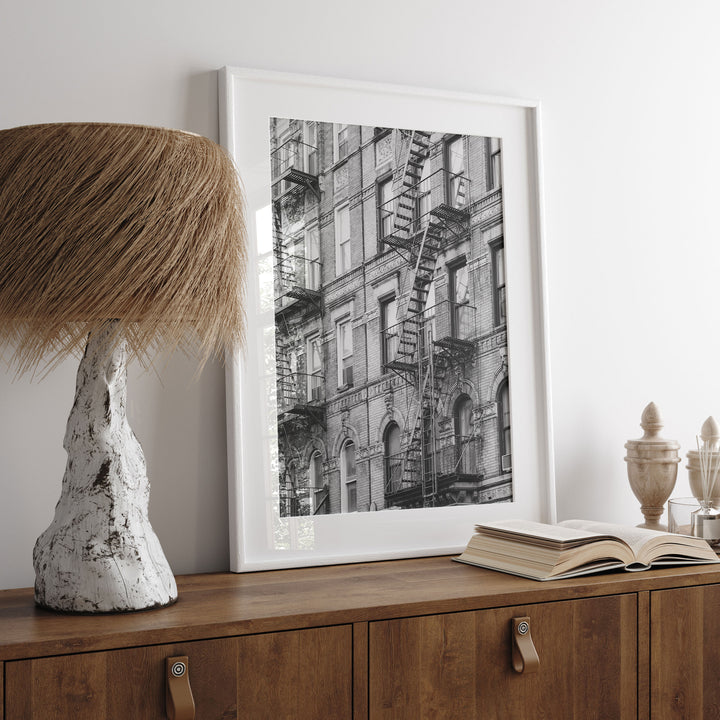 Fire Escapes, New York City – B&amp;W wall art displayed in a room setting