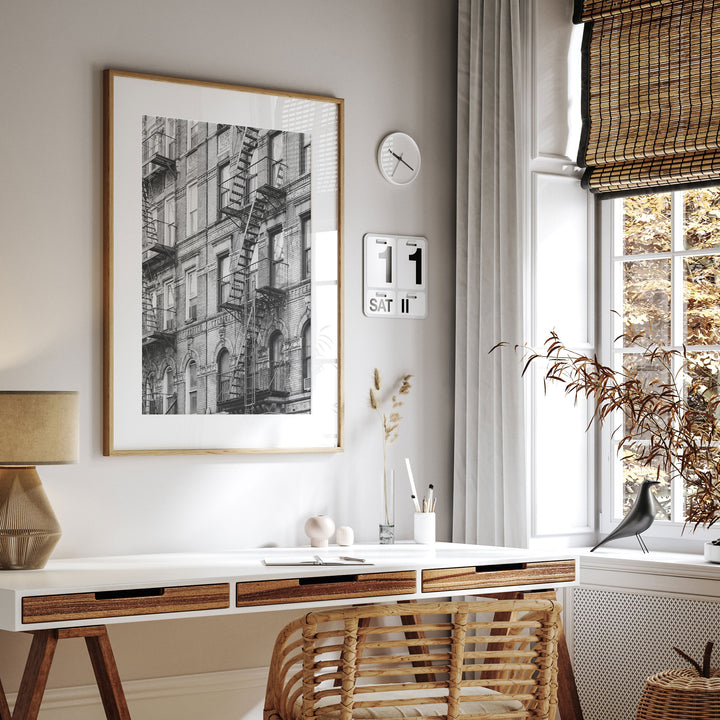 Fire Escapes, New York City – B&amp;W framed print hanging in a styled interior