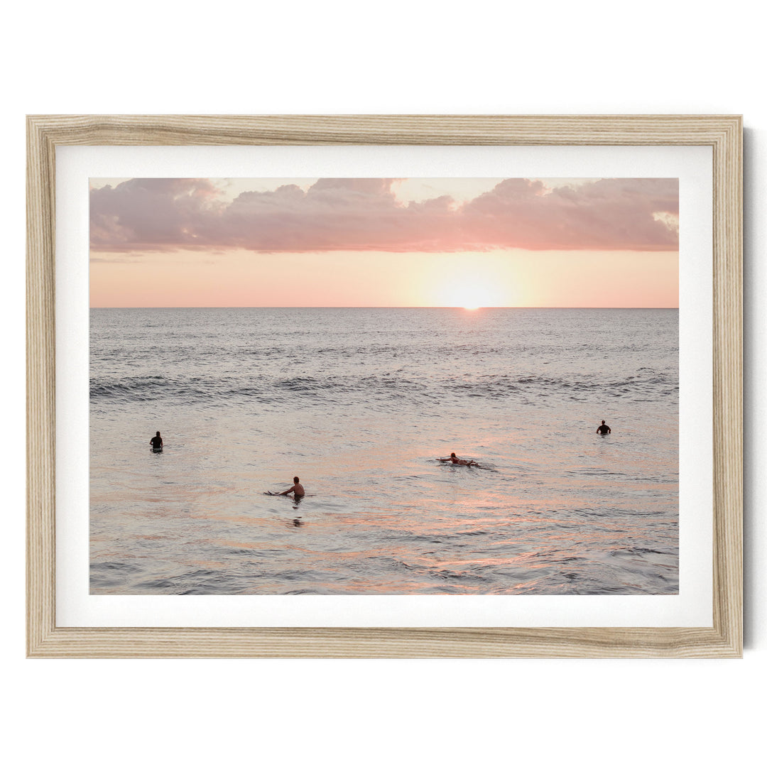 Surfers Waiting at Sunset, Costa Rica fine art print in a natural wood frame with white mat