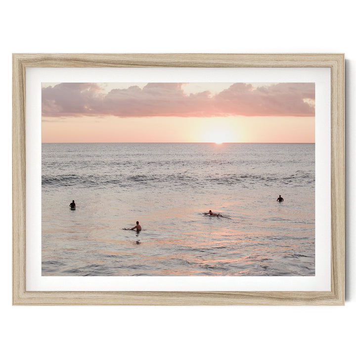 Surfers Waiting at Sunset, Costa Rica fine art print in a natural wood frame with white mat